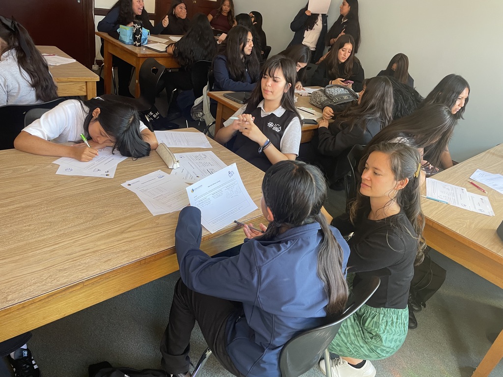 Pei-Ling working with ICA Cristo Rey Academy students during a workshop