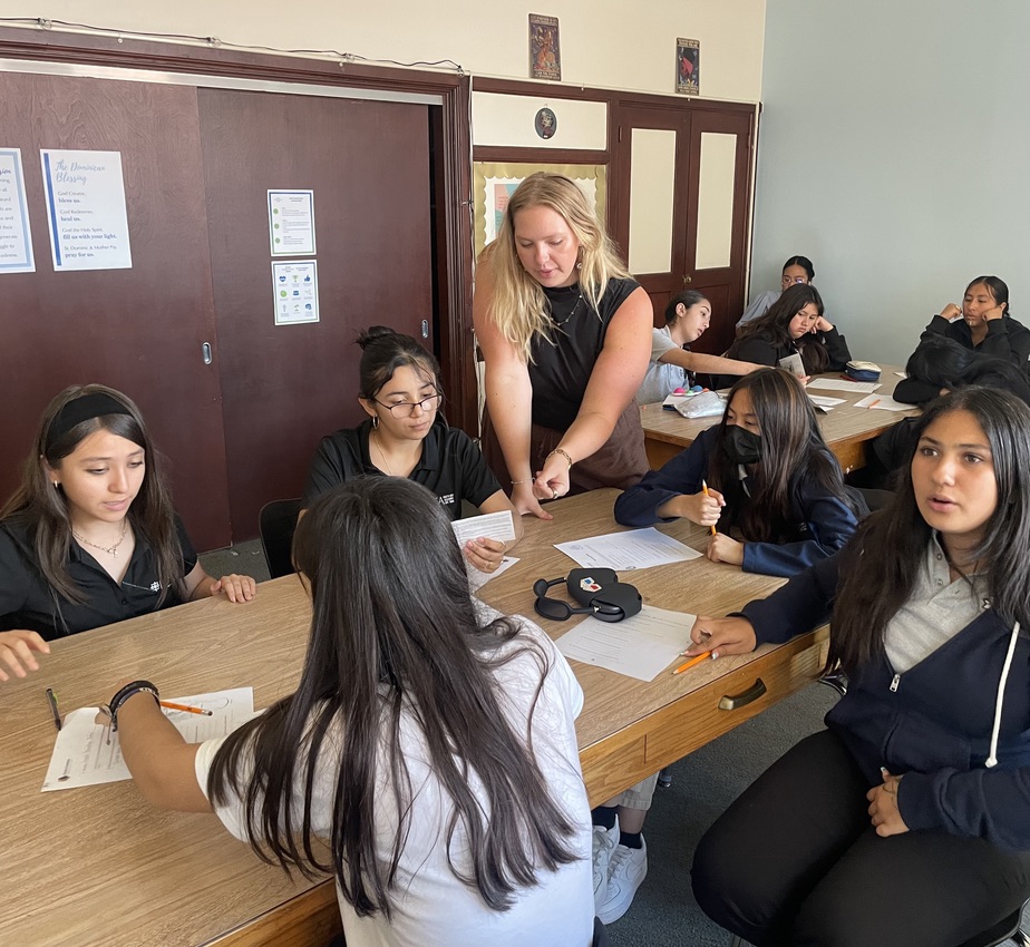 Leah working with ICA Cristo Rey Academy students during a workshop